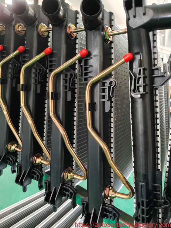 Radiator with Copper Oil Cooler vs. Radiator with Aluminum Oil Cooler: A Visual Material Comparison