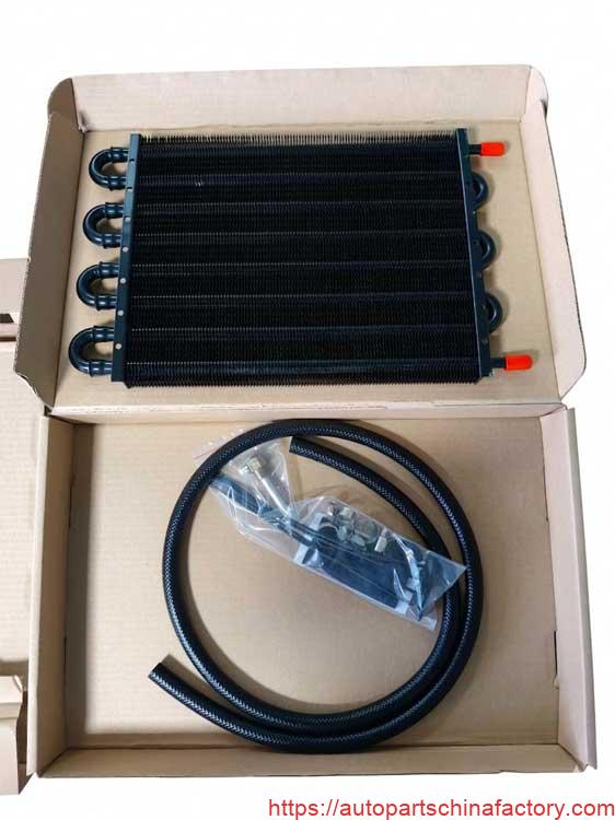 Heavy-duty auxiliary tube and fin oil cooler kit APCF-52357 with installation line and hardware.