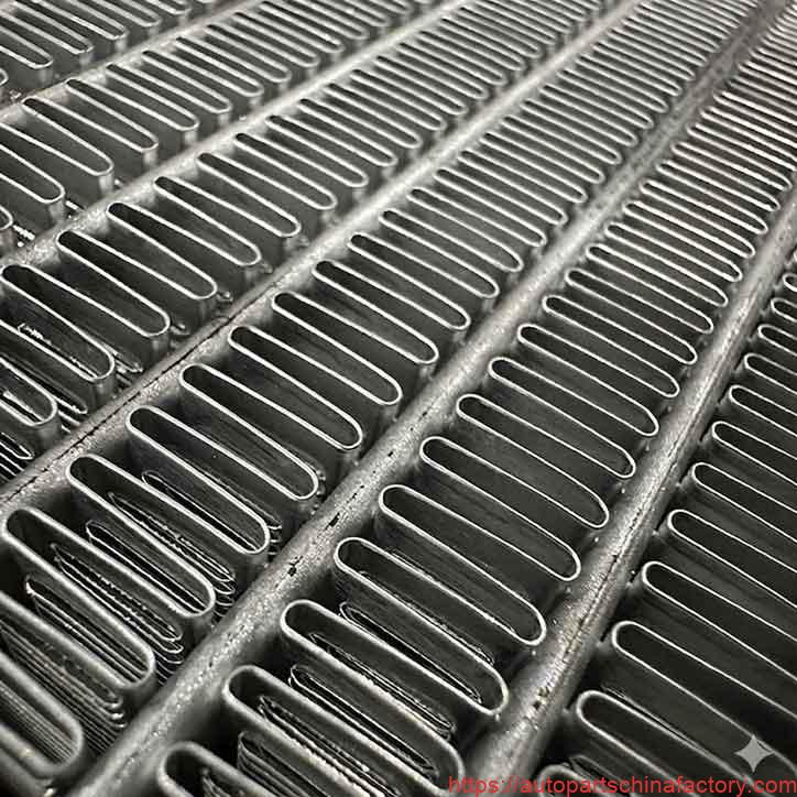 Close-up macro view of the aluminum cooling fins on the APCF-72278 radiator core.